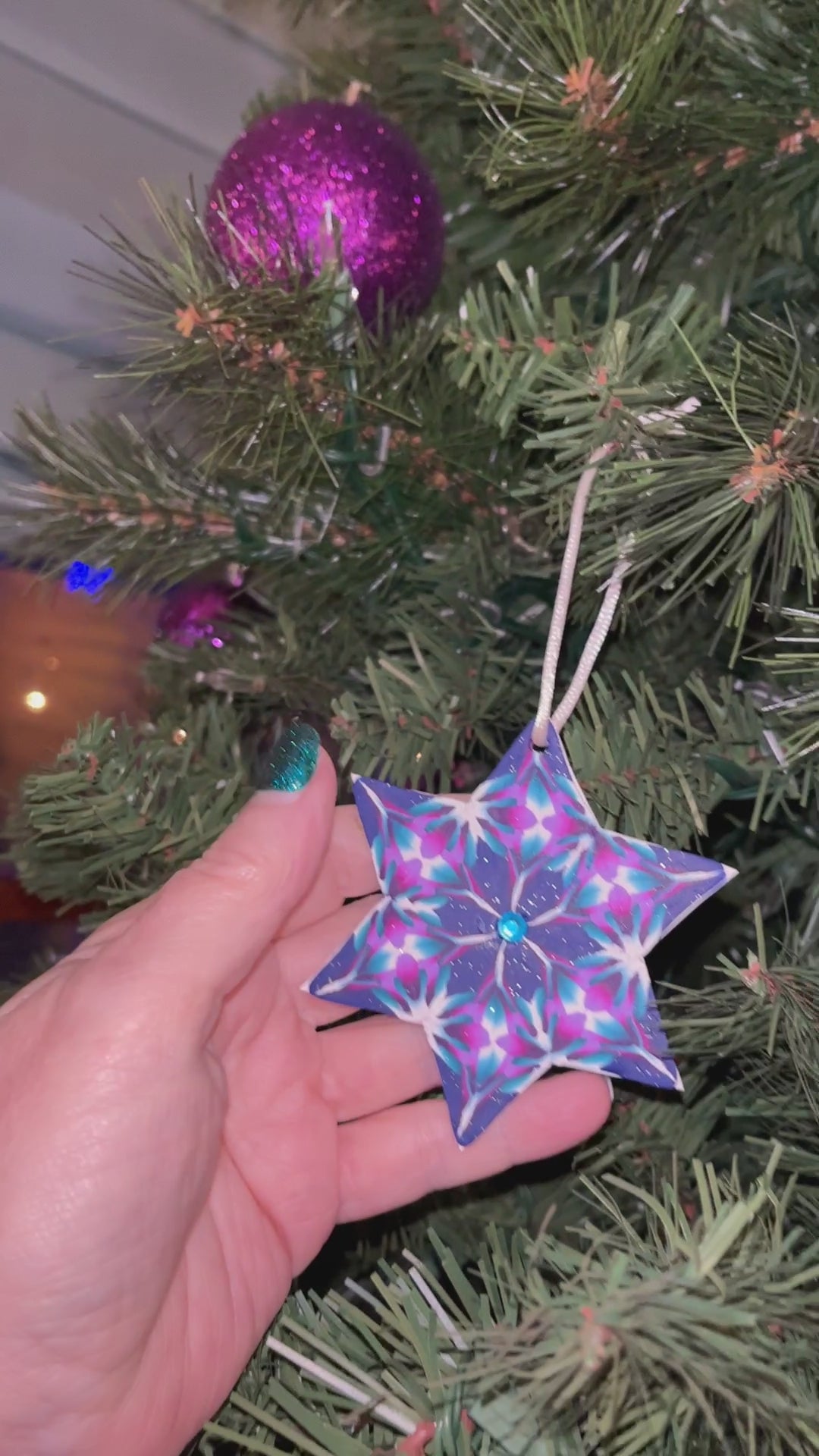 6 pointed star with sparkle blue, turquoise, white, purple, lavender and fuschia canes,